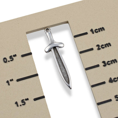 Hackberry Creek antique silver plated Zamak sword dagger charm, 38.5mm long, double-sided with recessed front for enamel.