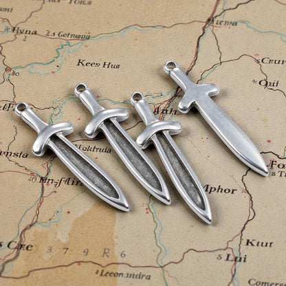 Hackberry Creek 4 antique silver sword dagger charms with recessed fronts for enamel, medieval fantasy jewelry making.