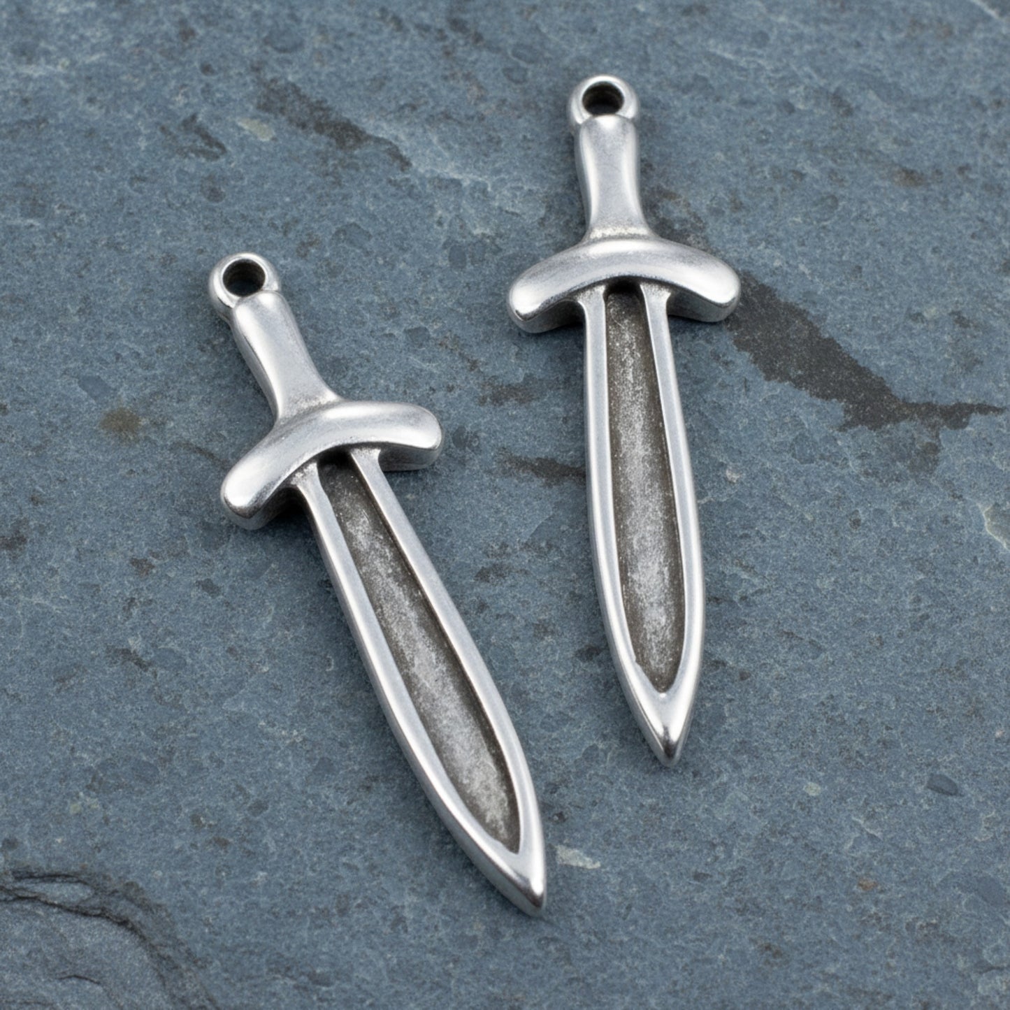 Hackberry Creek 4 antique silver sword dagger charms with recessed fronts for enamel, 11.5mm x 38.5mm.