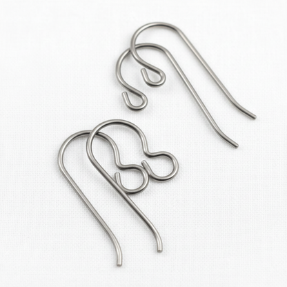 Hackberry Creek titanium earring hook starter set featuring regular and front loop styles in natural steel-gray finish.