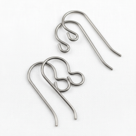 Hackberry Creek titanium earring hook starter set featuring regular and front loop styles in natural steel-gray finish.