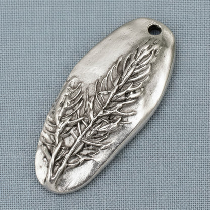 Hackberry Creek antique silver plated pewter oval pendant with a detailed tree design. Unique focal piece for jewelry making.