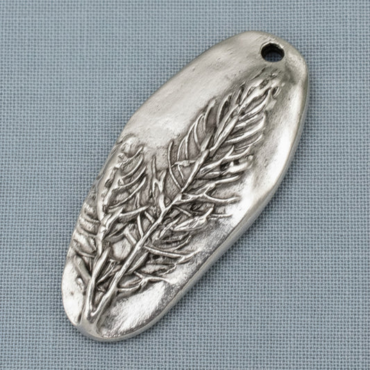 Hackberry Creek antique silver plated pewter oval pendant with a detailed tree design. Unique focal piece for jewelry making.