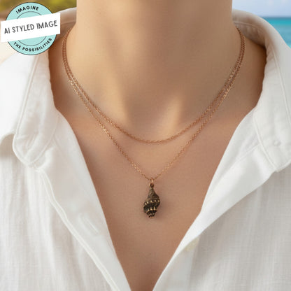 Hackberry Creek 21mm copper-plated pewter trumpet shell charm with intricate detailing, perfect for beach and nautical jewelry.