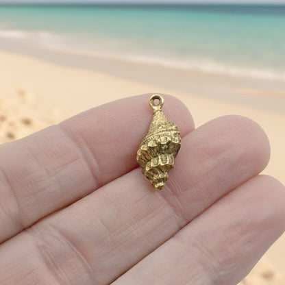 Hackberry Creek 24K gold plated pewter trumpet shell charm with intricate detailing and antique finish.