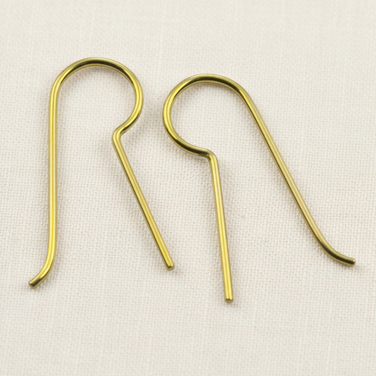 Hackberry Creek yellow niobium earring hooks with a 14mm customizable leg for jewelry making and sensitive ears.