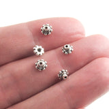 Silver BeadAligner Bead Stabilizers in hand