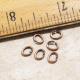 50/Pkg Antique Copper Plated Medium Oval Jump Rings, TierraCast 5x6mm